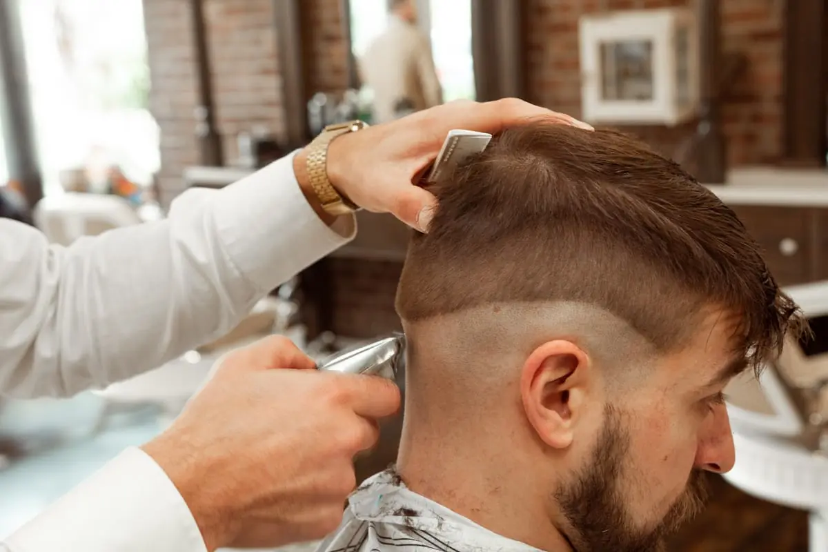 Detailed fade haircut in progress